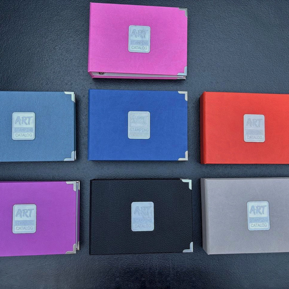 Set of eight colorful folders on a dark surface