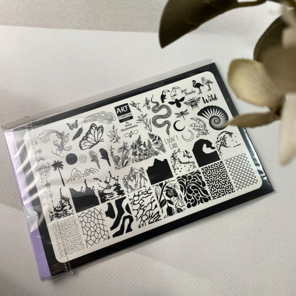 Stylized design sheet with black patterns on a white surface