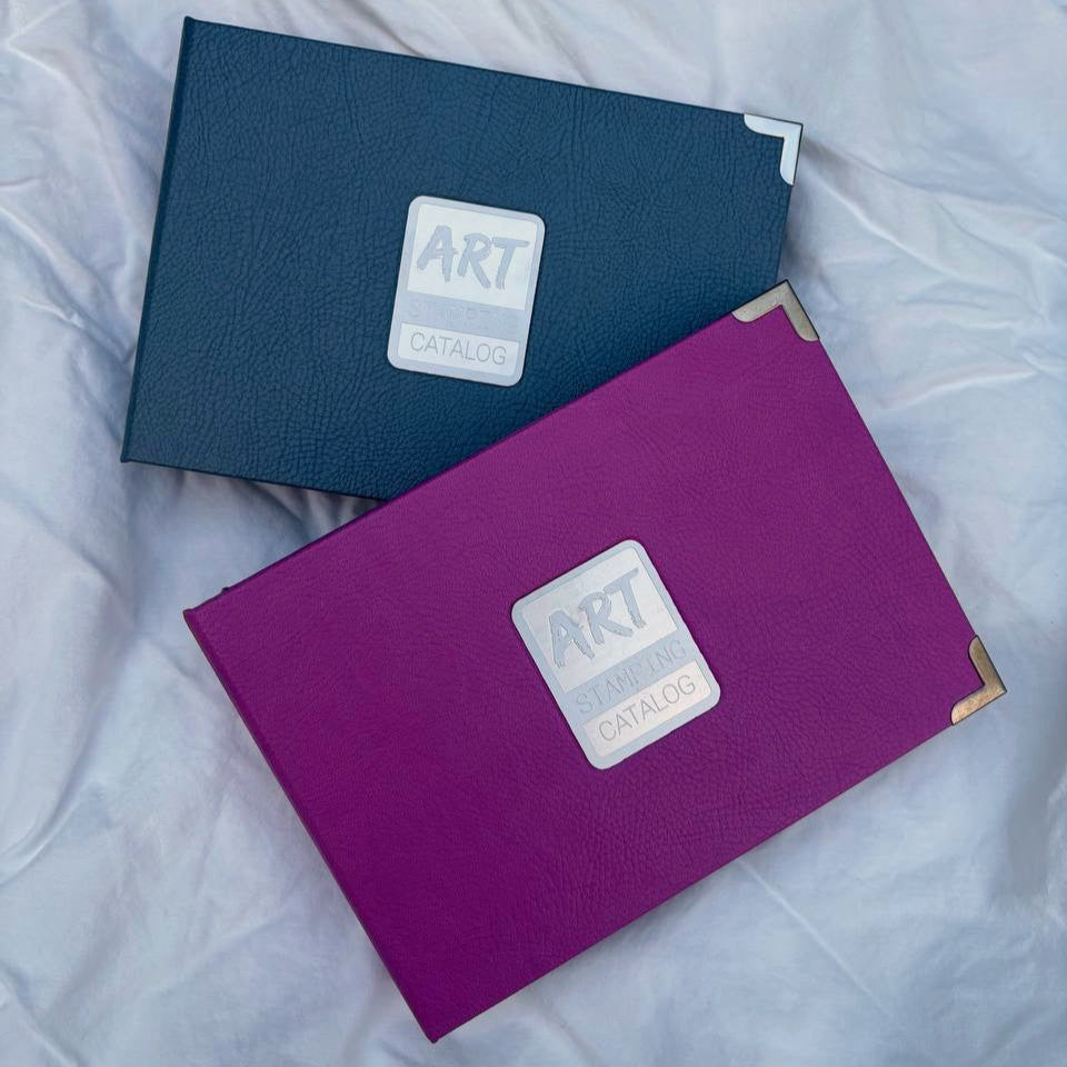Two folders for nail art stamping plates, one blue and one purple, with 'ART Stamping' logo on a white textured surface.