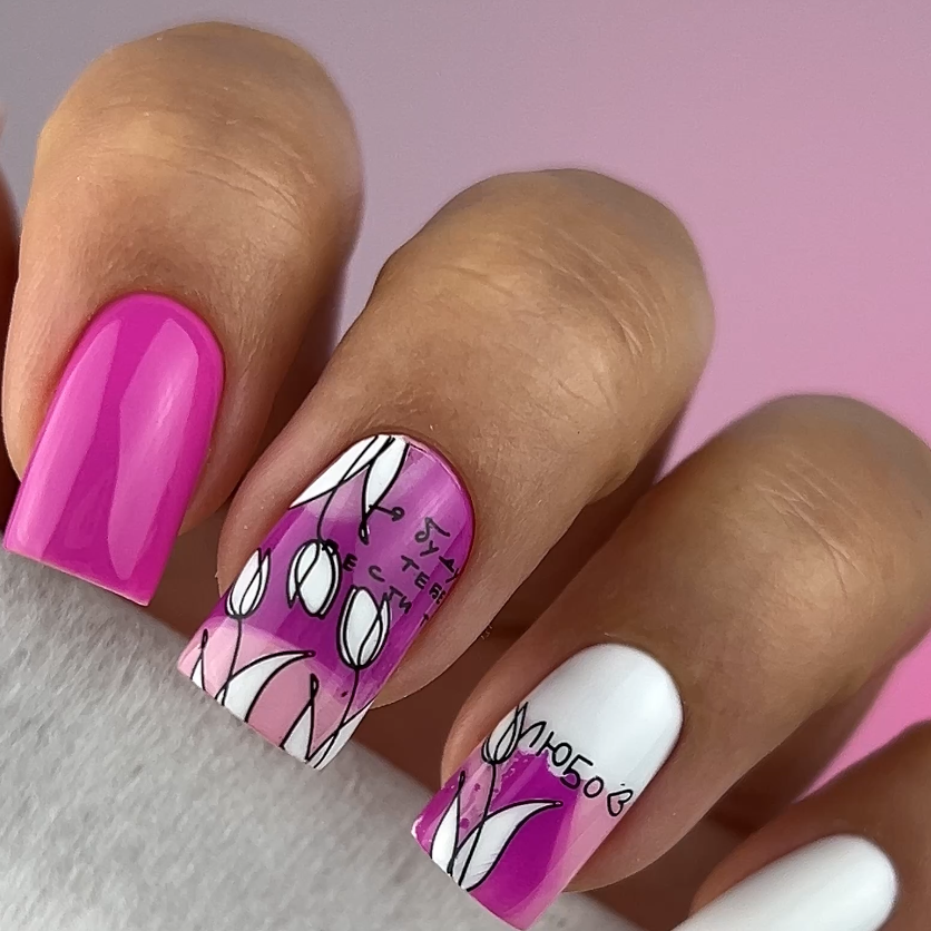 Nail art with pink, white, and purple design on a gradient background
